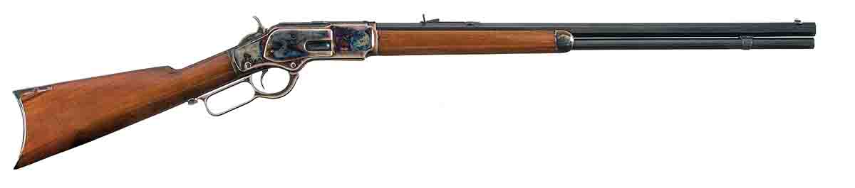 This early M73 rifle features a color case receiver, hammer, grip cap and crescent steel buttplate. Note the stepped receiver ring for smaller calibers and integral dust cover guide.  This M73 musket shows standard features, including barrel bands, 30-inch barrel, leaf-type rear sight and integral dust cover guide.